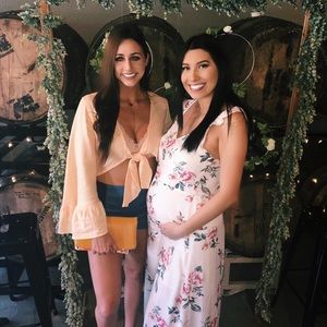 Beautiful tangerine colored wrap top from boutique